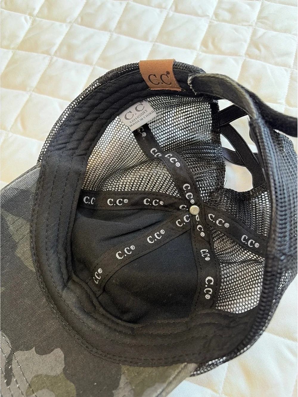 C.C. Distressed Camo Ponytail trucker hat